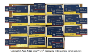 Close up of Counterfeit Accu-Chek SmartView packaging with identical serial numbers